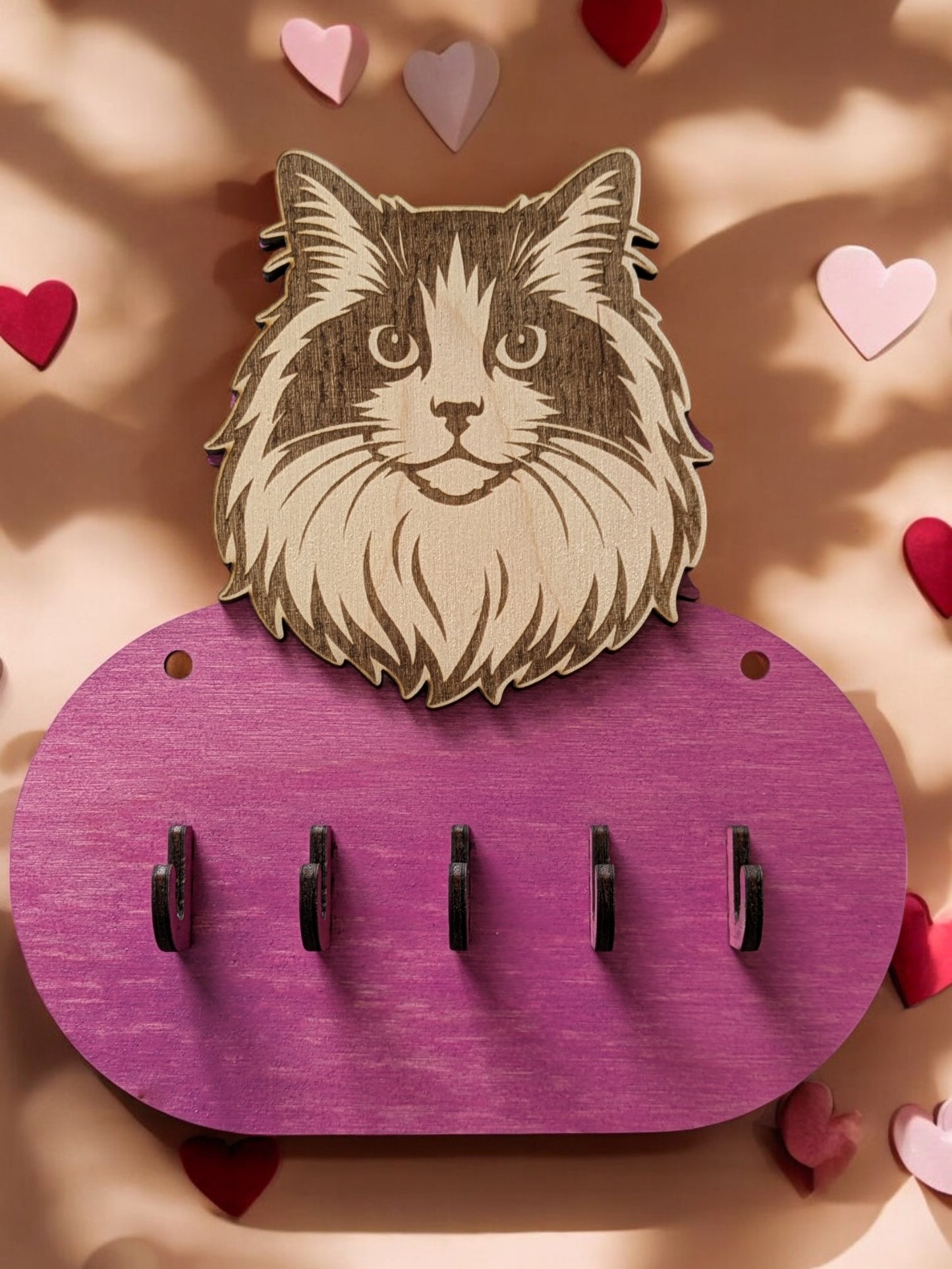 Kaunis kissanaulakko pikku tavaroille