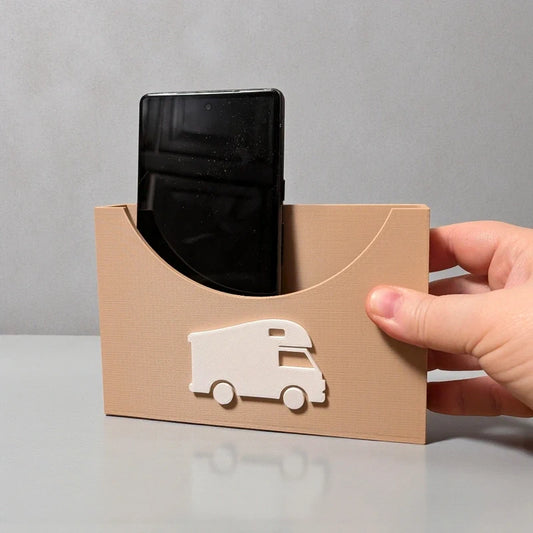 Seinälle kiinnitettävä puhelinteline – asuntovaunun ja auton järjestäjä