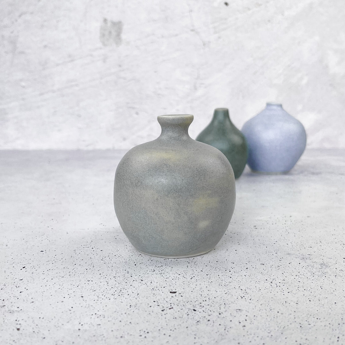 Vase glazed with BOTZ 9861 Concrete Grey on white clay, fired at 1250°C