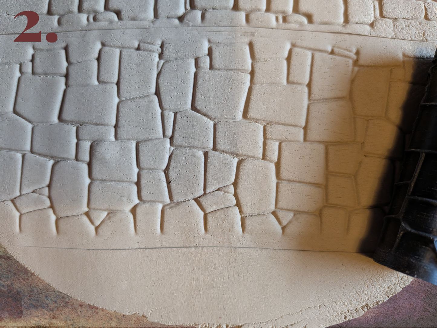 Kuviokaulin – kivikatu ja seinäkuviot