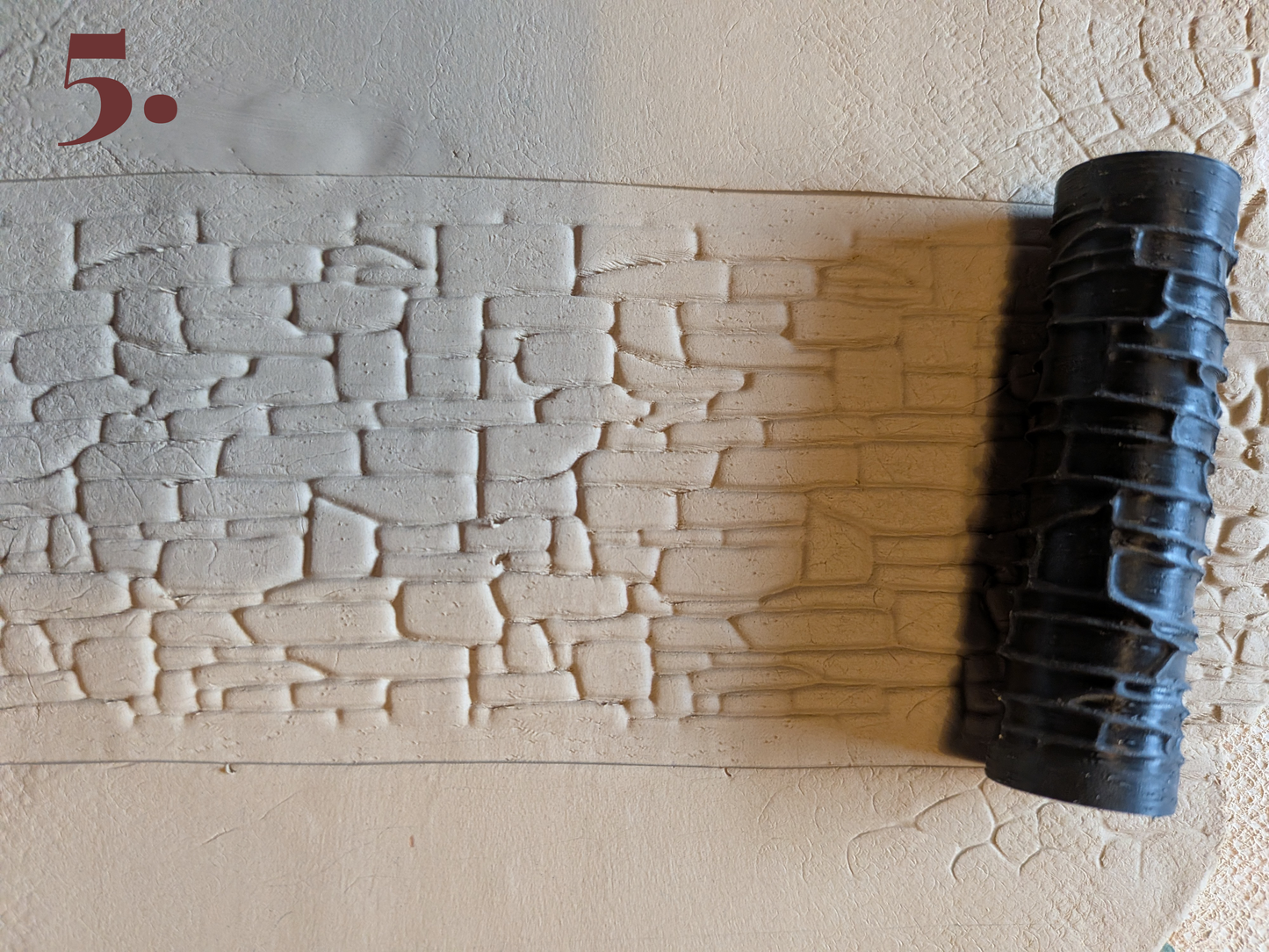 Kuviokaulin – kivikatu ja seinäkuviot